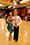Erik and Rickie winning dancesport competition. Green latin dress. White latin shirt.